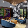 colorful leasing office lounge with light bright wall