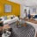 Yellow accent wall in apartment living room