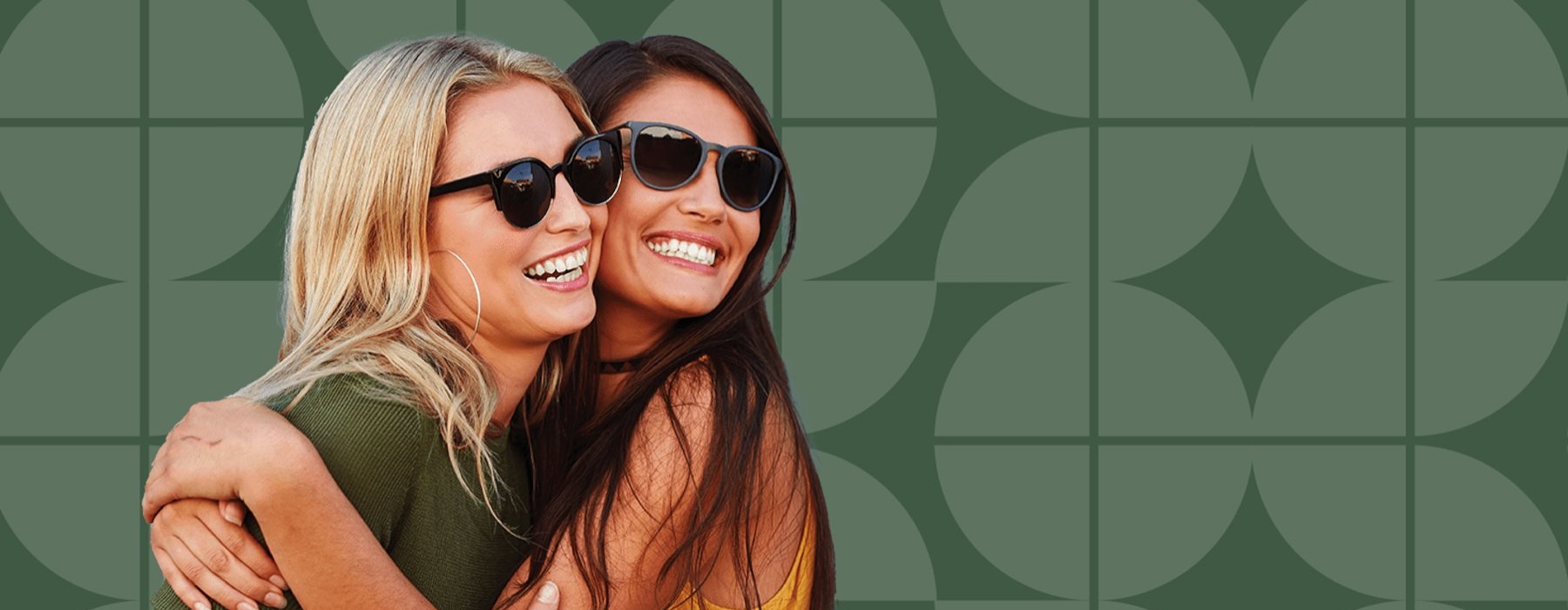 lifestyle image of two friends embracing