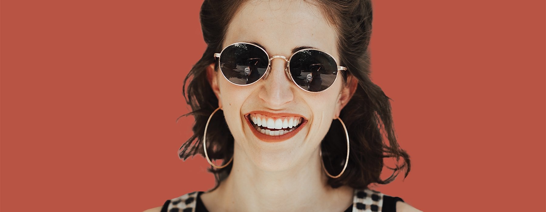 lifestyle image of a woman smiling